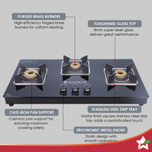 Load image into Gallery viewer, Octavia 3 Burner Glass Hob Top Manual Cooktop | 8mm Toughened Glass | Manual Ignition | Forged Brass Burners | Stainless Steel Drip Tray | Anti-Skid Legs | Large &amp; Heavy Pan support | LPG compatible | Black steel frame | 2 Year Warranty | Black