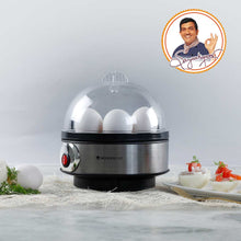 Load image into Gallery viewer, Instant Electric Egg Boiler with 7 Egg Poachers|3 Boiling Modes, Soft, Medium, Hard| Auto Shut Off Technology| Non-stick Egg Rack, Transparent Lid, Stainless Steel Body &amp; Heating Plate, Steamer Rack| Alarm| Easy &amp; Quick Operation| Black| 2 Year Warranty