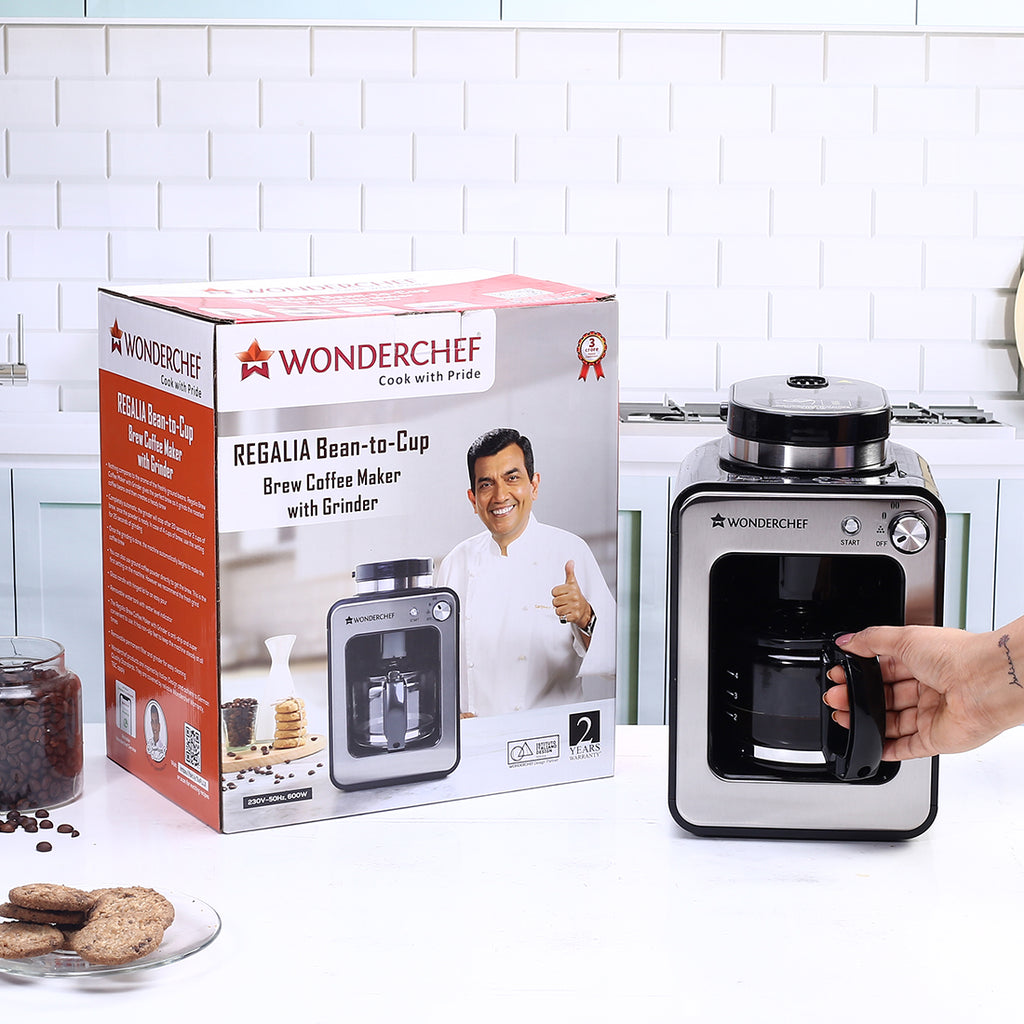 https://www.wonderchef.com/cdn/shop/products/GiftBoxkitchenBG_RegaliaCoffeeMaker-BeanToCup_63154558_1024x1024.jpg?v=1680782012